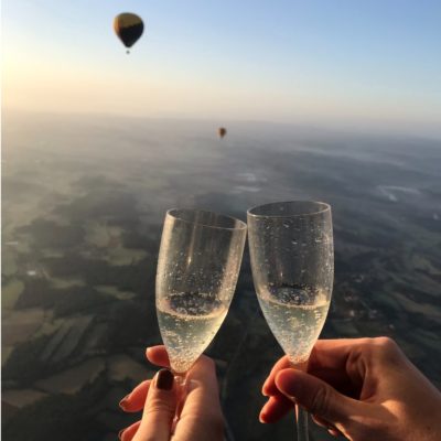 champagne-in-hot-air-balloon-picture-id1254985376