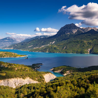 France, Hautes-Alpes (05), Baie-Saint-Michel. Serre-Poncon Lake and Grand Morgon peak in Summer. Durance Valley, European Alps, Provence-Alpes-Cote d'Azur (PACA)