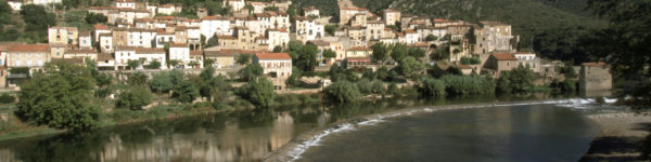 Europe, France, Languedoc-Roussillon, Haut Languedoc, Herault 34, Roquebrun, River Orb, Hillside village by river